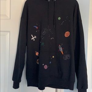 Hand embroidered black sweatshirt.